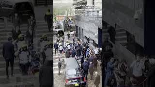 MOMENT: Police tackles protester charging at French president Emmanuel Macron in Amsterdam