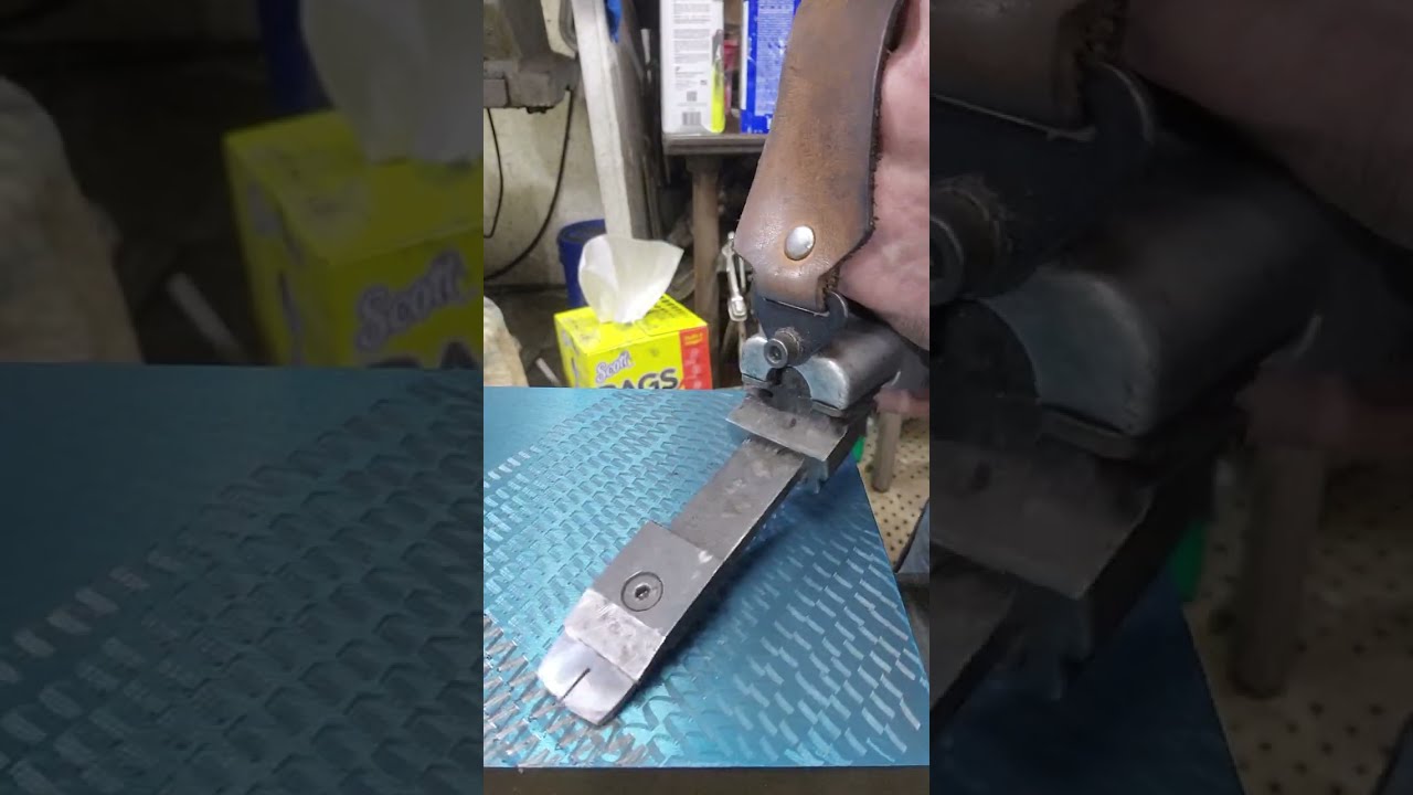 Scraping an initial pass on a cast iron block