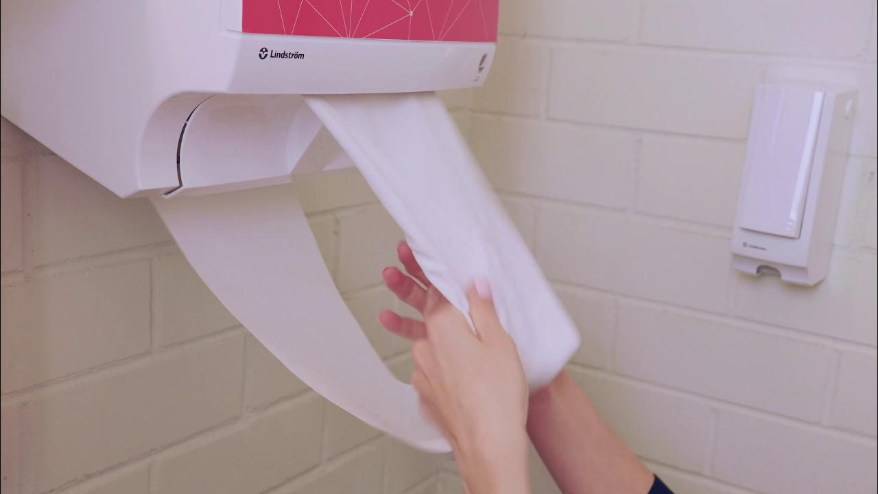 How to dry your hands with Lindström Cotton Towel Dispenser? 