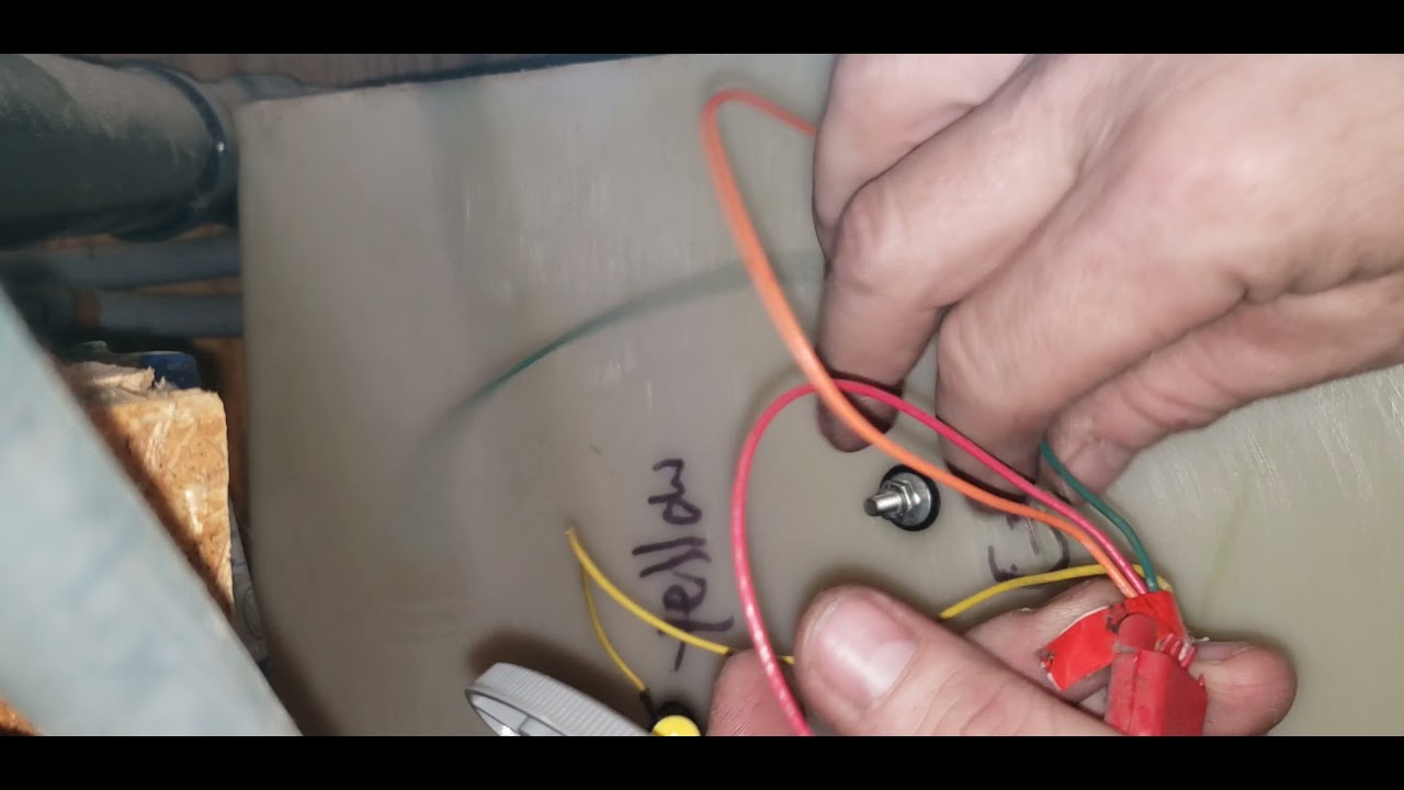 Removing the fresh water pump from a 1993 Jayco 300FK Travel Trailer