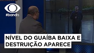 Nível do Guaíba baixa e destruição aparece