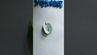 paper half cutted green apple