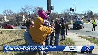 Along the preocessional route for Master Sgt. Tietjens