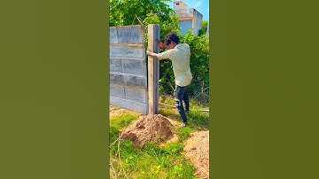 PRECAST readymade compound column is lowered into the ground by labour in this manner#precast
