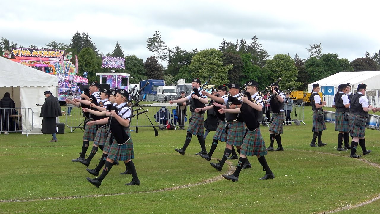 Ellon & District Pipe Band competing in Grade 4B during the 2022 Aberdeen Highland Games in Scotland