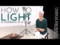 How to light a newborn in a prop with strobe lighting