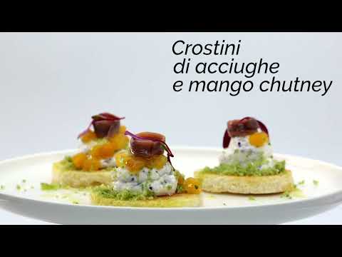 Crostini di acciughe e mango chutney