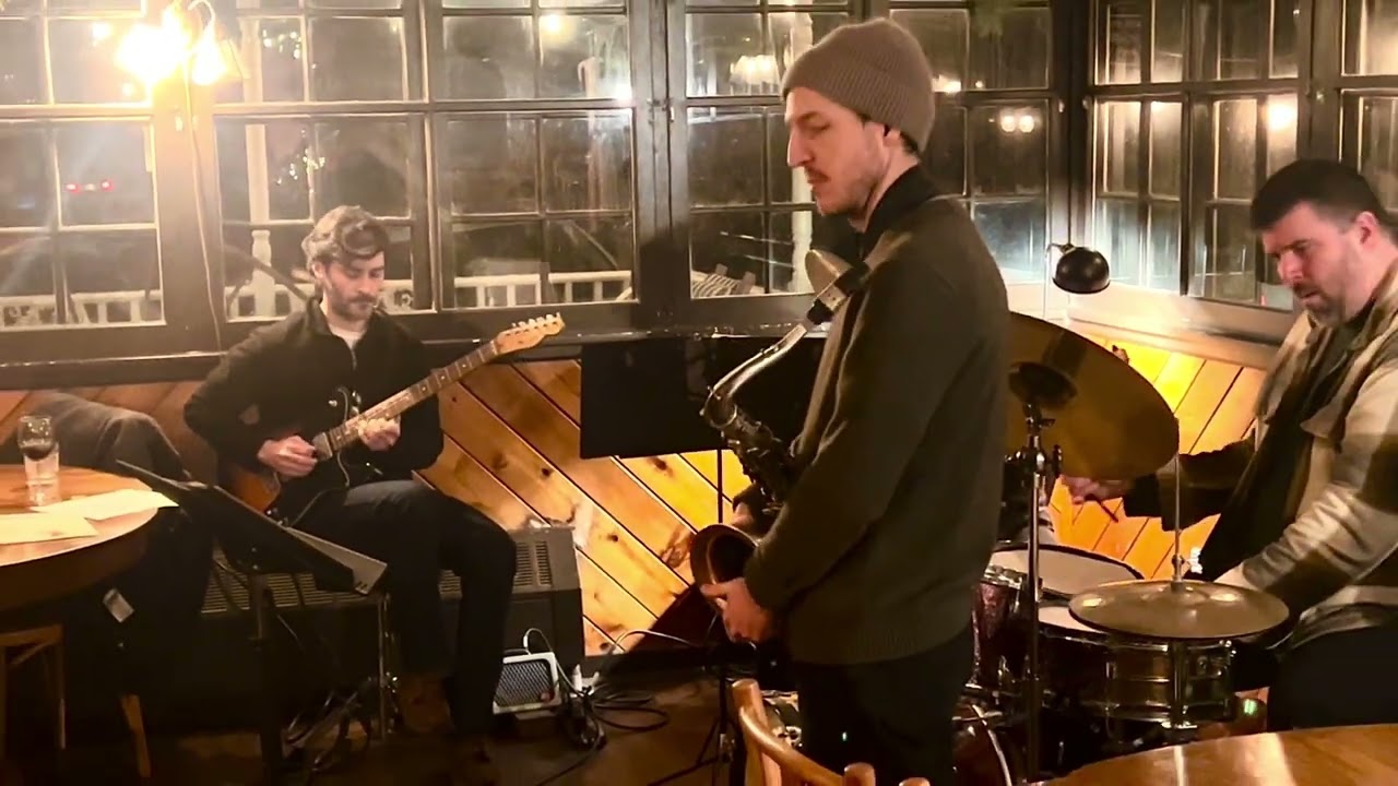 “Welcome” performed by Matthew Albeck Trio + Adam Lozier, composition by Ricky Ford