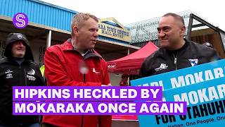 Cutting through the noise (and hecklers) as politicians brave the rain in Auckland | Stuff.co.nz