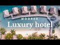 A perfect day at the manava resort  spa of moorea in french polynesia  4k drone footage