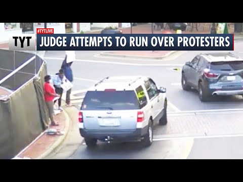 Judge Attempts To Run Over Protesters