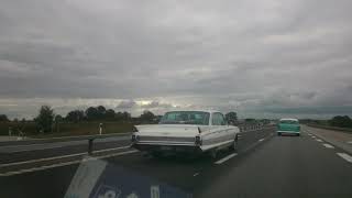 Old's cars on the highway (Sweden).