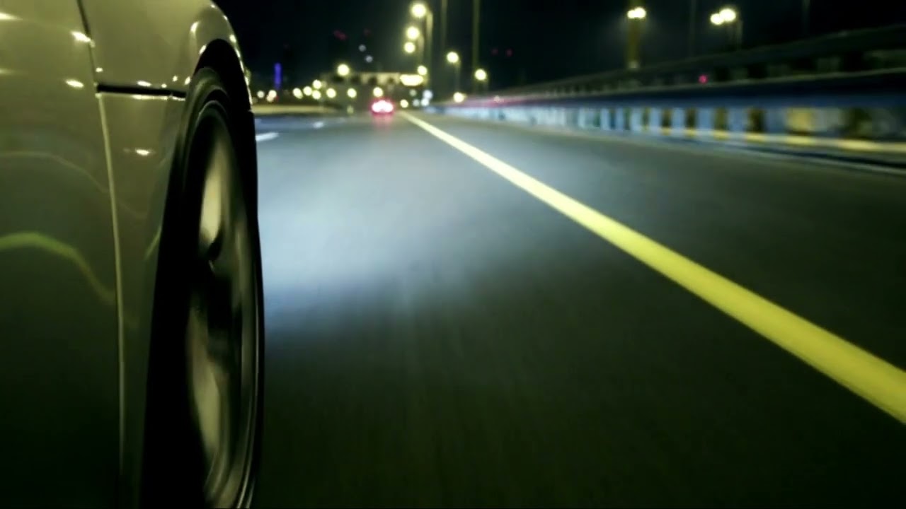 Sports car highway wheel at night stock footage 