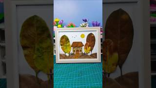 Kolase rumah dan pepohonan dari daun kering.. Kolase rumah dan pepohonan dari daun kering..