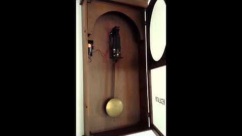 How to convert noisy wind up clock to quiet Quartz atomic clock