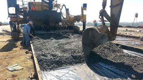 cho thuê máy rải bê tông xi măng sân bay, sân bãi: SP500, Gomaco, Power Curber