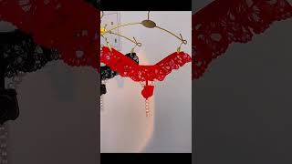 Lace With Rose And Pearl Embellishments.