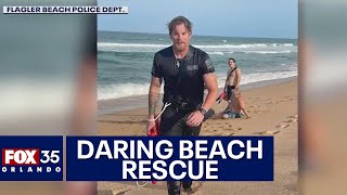 'Protecting and serving': Fast-acting Florida police officer leaps into ocean to rescue swimmers