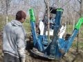 Harvesting trees with our Bobcat S630 and 36" CareTree Spade.