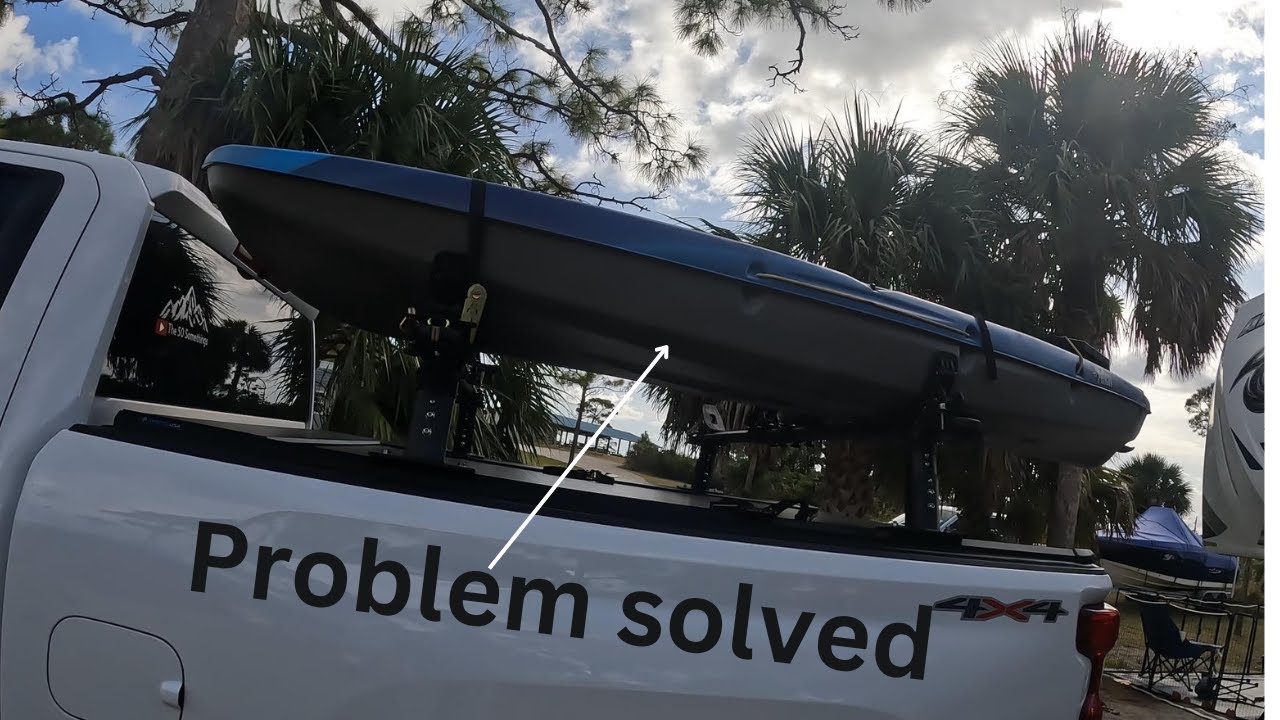 Removable Kayak and bike transport rack solution for pickup bed covers.