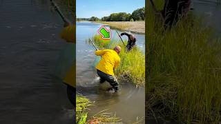 How did these two brothers work together to catch fish from the river? 😱 #shortvideo #fishing