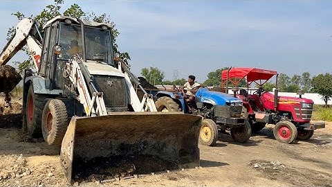 New Jcb Backhoe Loader Machine Loading Mud In Mahindra yuvo and Newholland Tractor | Jcb and Tractor