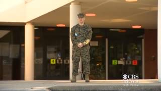 Ex-marine stands guard outside kids' school