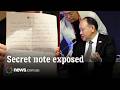 Awkward moment Chinese diplomat&rsquo;s secret note is read out loud in front of live audience