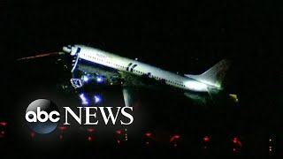 Plane slides off runway into river