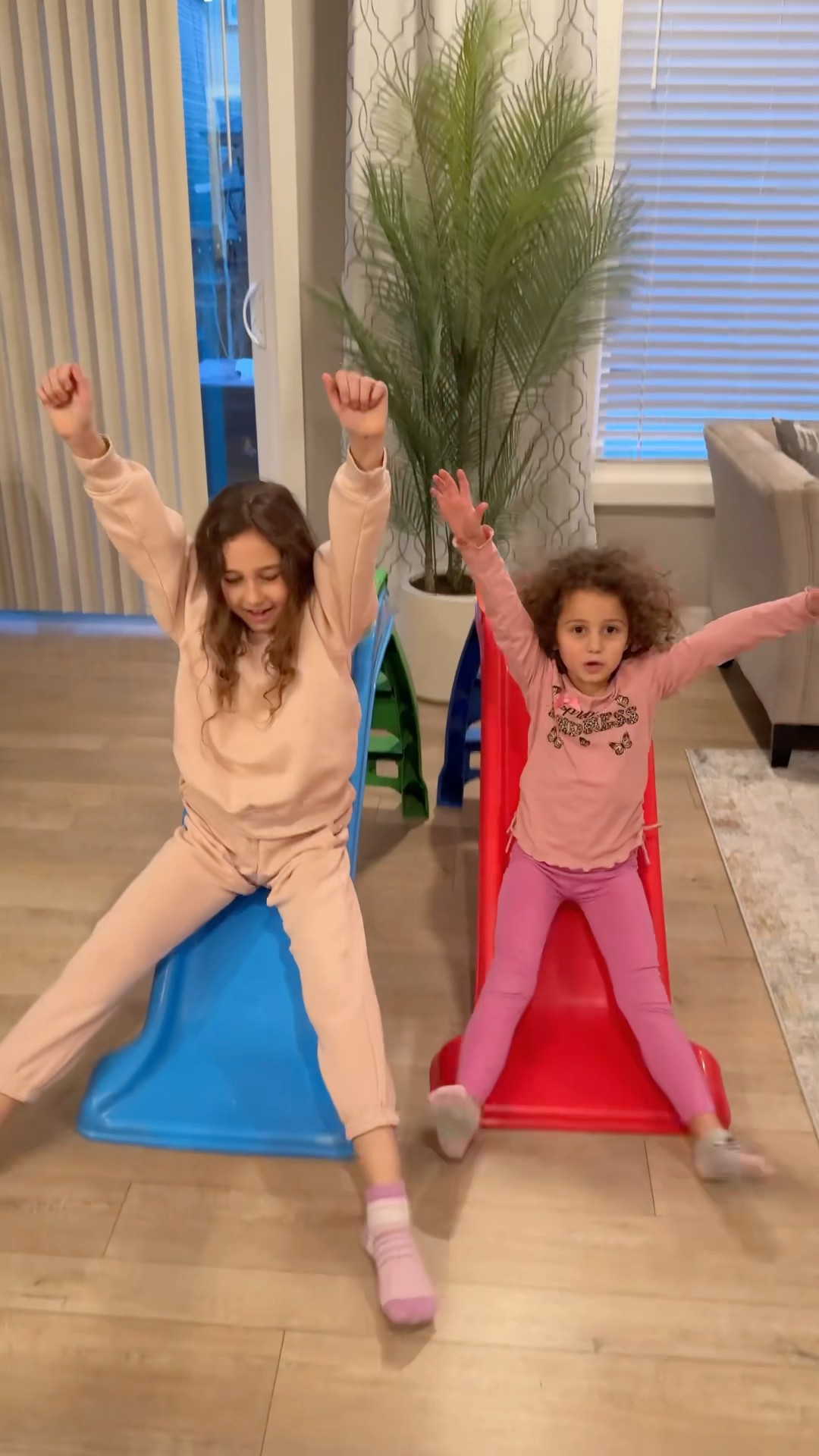 The kind sister-Sierra shares with Rhia and fixes her broken slide- sharing is caring