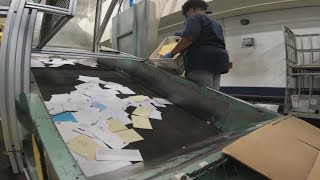 USPS in Little Rock working hard to deliver letters to Santa and make sure packages get under the tr