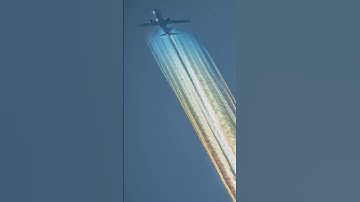 First Short #iridescent #rainbow #aviation #contrails #planespotting #camera #nikon #photography