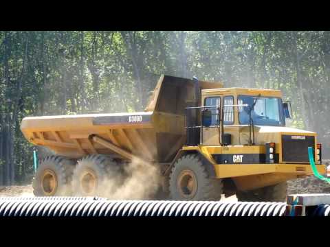 Caterpillar D300D articulated dump truck at work