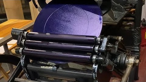 Printing handouts in reflex blue ink for our school programs using our 10x15 Chandler & Price press