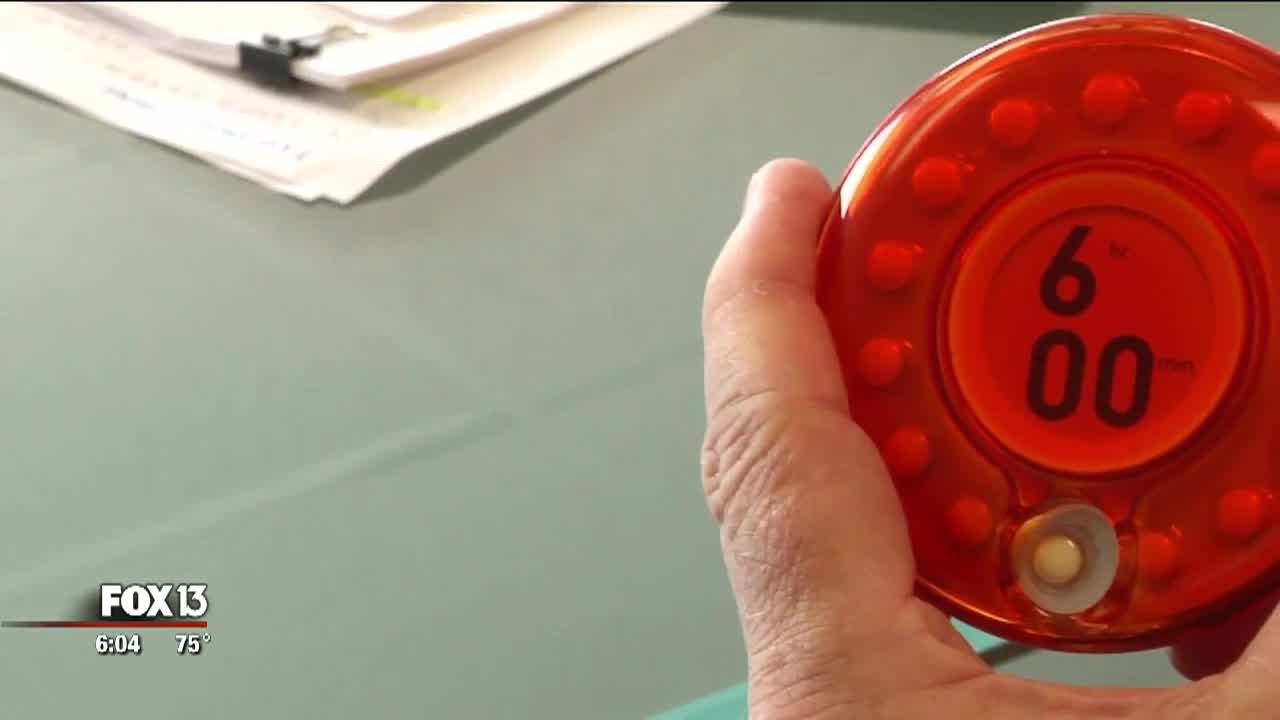Pill dispenser with lock, timer could prevent opioid addiction - YouTube