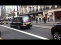 Margaret Thatcher's coffin drives past in a hearse
