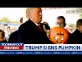 Horrified pumpkin tries to carve out Trump's signature