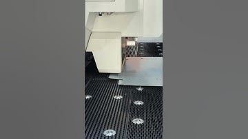 CNC punching machine, punching holes on iron plates！#cncmachine #sheetmetal  #manufacture #punching