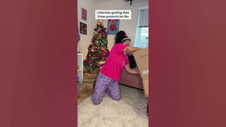 Little kids opening Christmas Presents