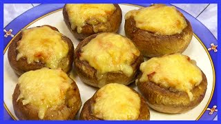 Champignons baked with fried onions, breast and cheese