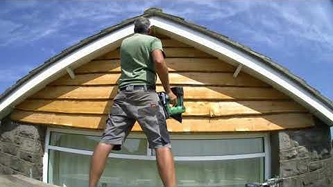 Installing Larch Waney Edge Cladding.  Remove old timber Cladding. Gable End Cladding.