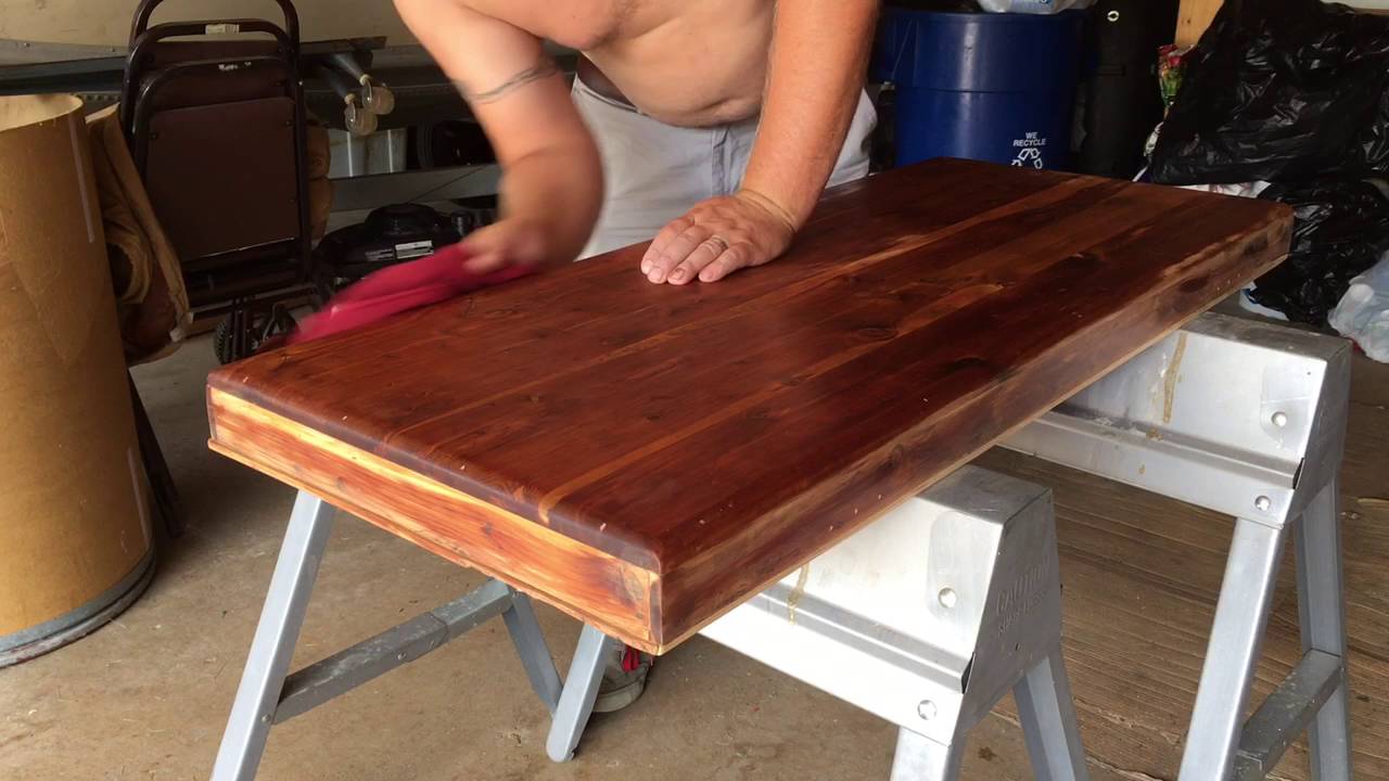 First coat of finish on cedar chest project - YouTube