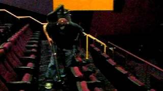 Cleaning Behind Theater Seats.AVI