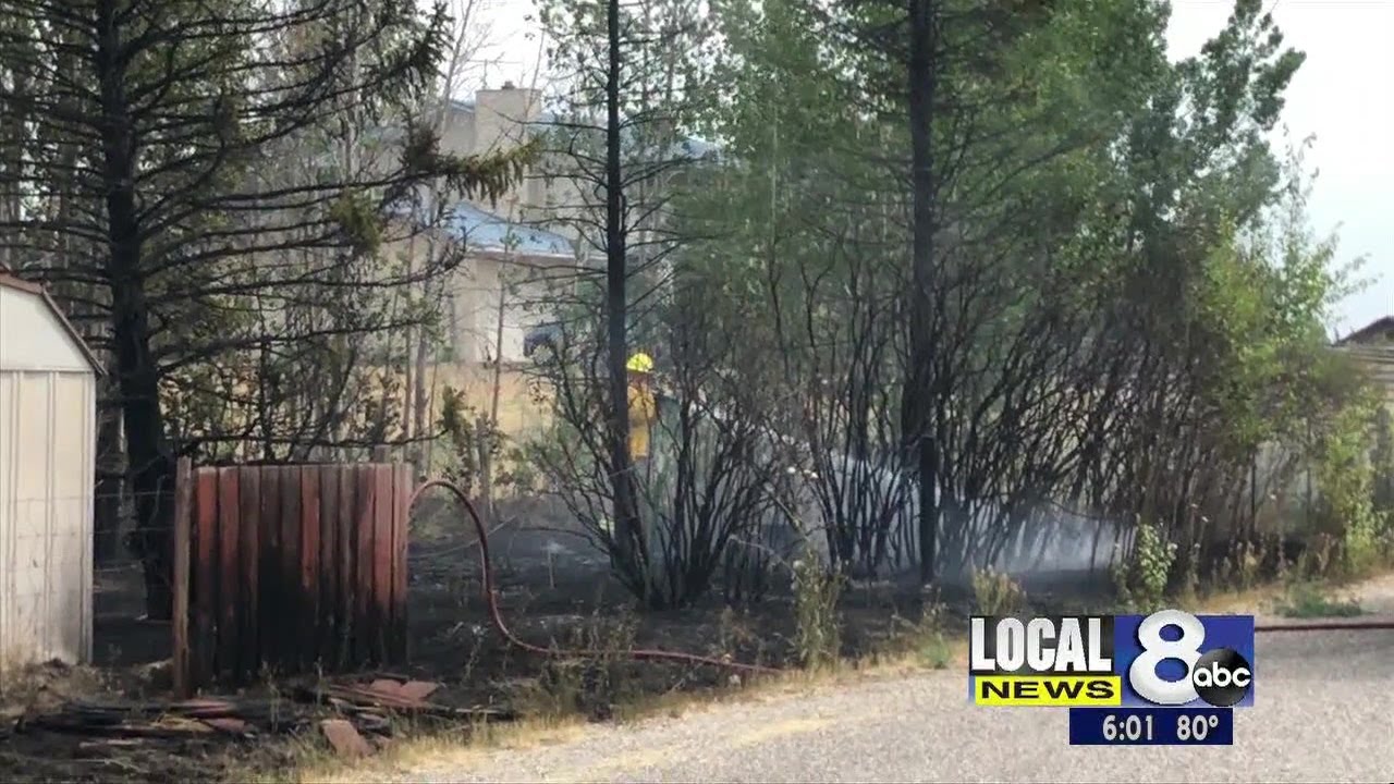 Crews protect home from fire