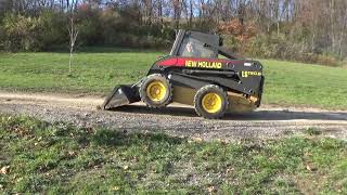 2005 New Holland LS190.B skid steer loader with bucket