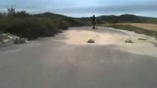 Downhill skateboard Talega. Follow behind.