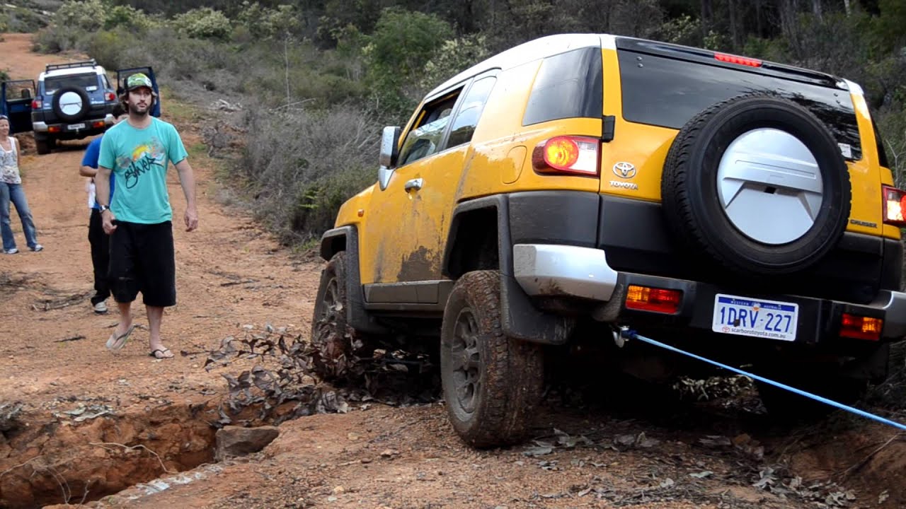 FJ Cruiser stuck in the mud and winched YouTube