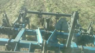 Case IH 7120 pulling a DMI 2500 ripper