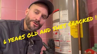 WHY IS THIS 6 YEAR OLD WATER HEATER ALREADY CRACKED  CAN YOU GUYS SPOT THE FAIL POINT 