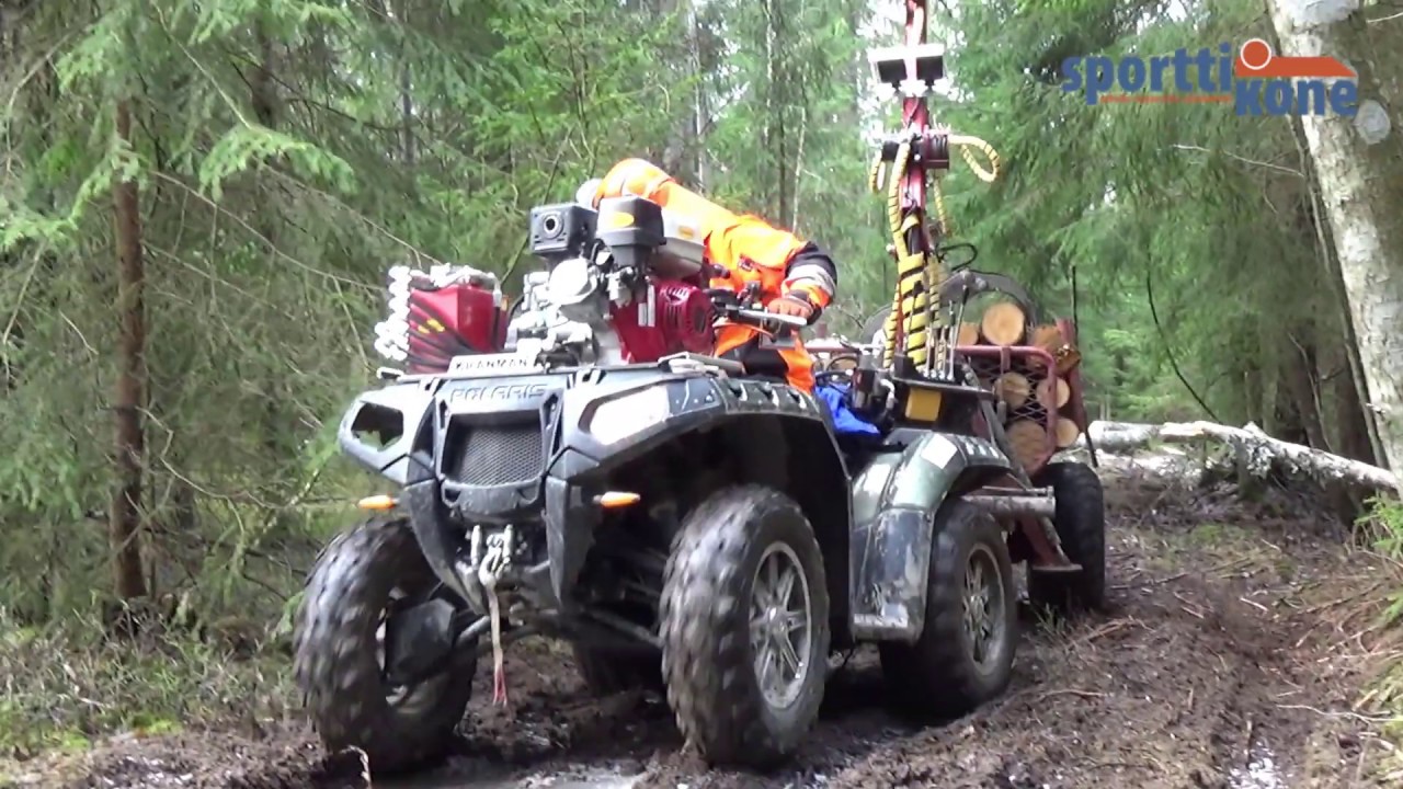 Kranman T1750 4WD metsävaunu ja Polaris mönkijä haastavissa tehtävissä.
